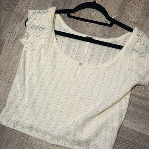 Adorable cashmere pointelle top by Free People. As new with spare button M